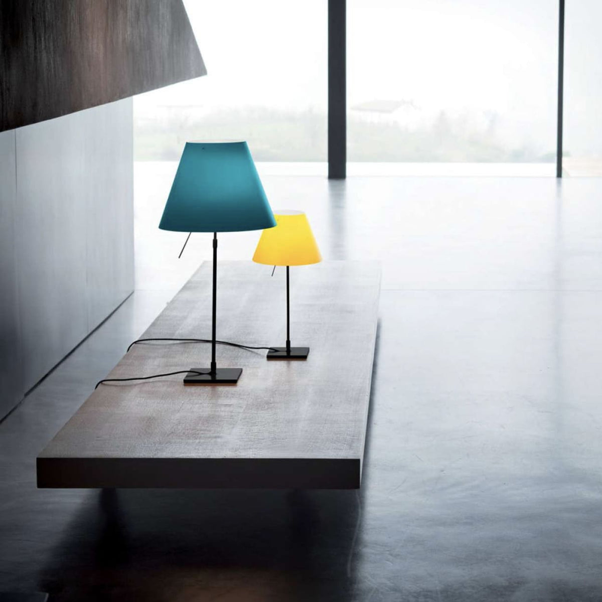 Costanza D13 mesa Luceplan